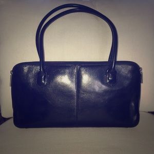 Black genuine leather Baguette bag.